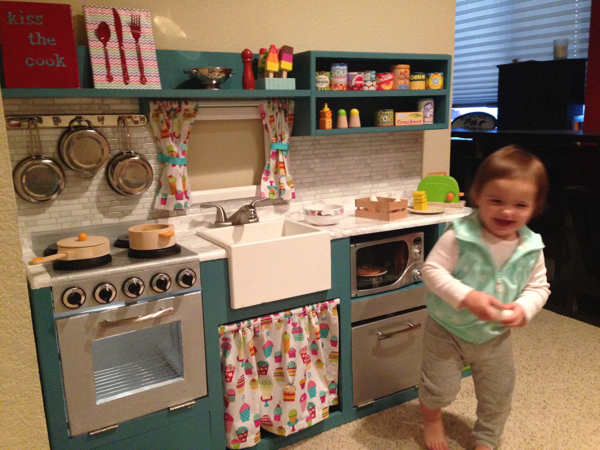 red and white play kitchen